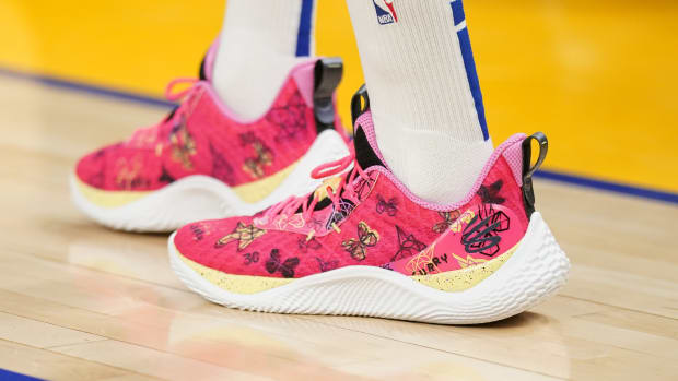 View of Stephen Curry's pink and white shoes.